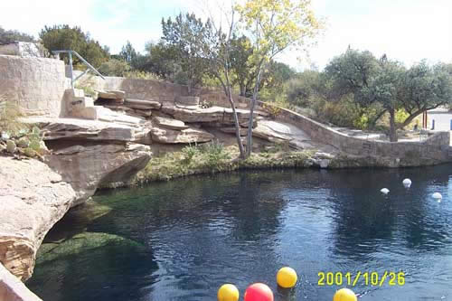 Blue Hole - 81ft of artisian water in Arizona...and they scuba dive in it